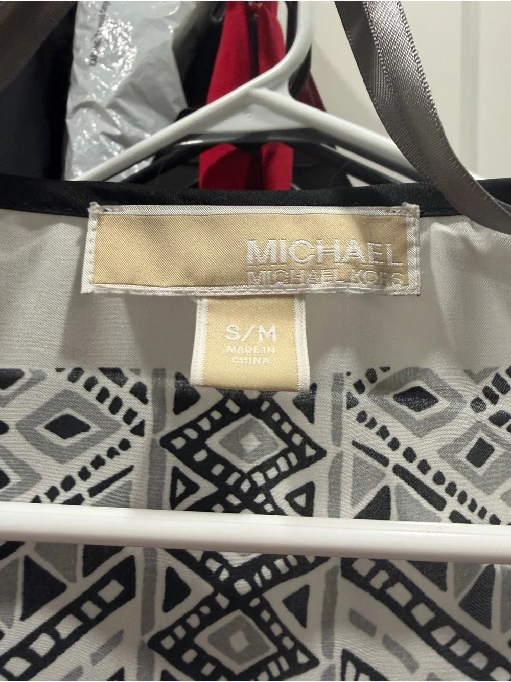 Michael Kors Elegant top with black and white geometric.  EUC
